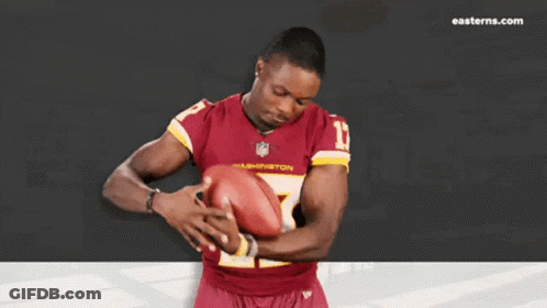 Man In Washington Football Jersey Holding Football GIF