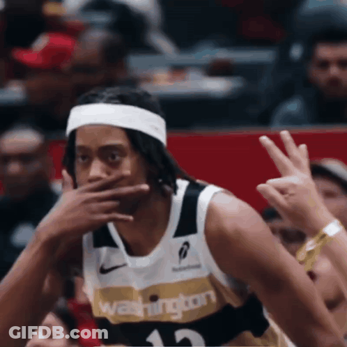 Man In Washington Jersey Covering Mouth GIF