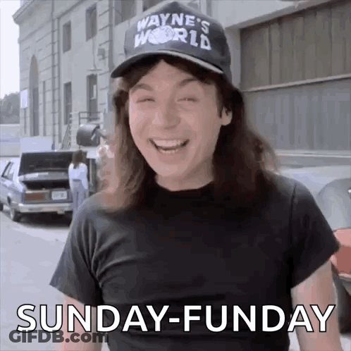 Man In Wayne's World Hat And Black Shirt Laughing Saying Sunday-Funday GIF