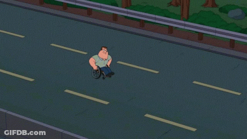 Man In Wheelchair On Highway GIF