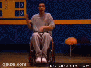 Man In Wheelchair Waving Hands GIF
