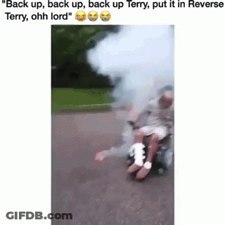 Man In Wheelchair With Bandage Pushed By Another Man GIF