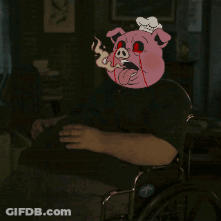 Man In Wheelchair With Cartoon Pig On Head GIF