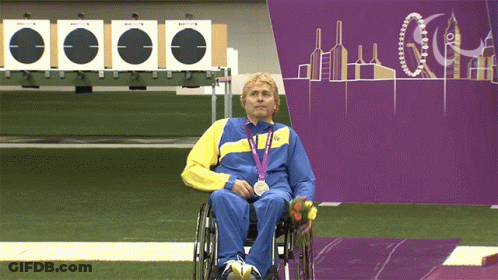 Man In Wheelchair With London 2012 Medal GIF