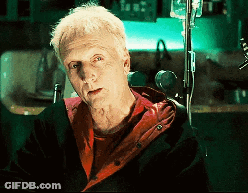 Man In Wheelchair With Needle In Arm GIF