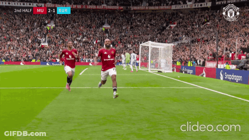 Man In White Adidas Jacket Stands Before Crowd GIF