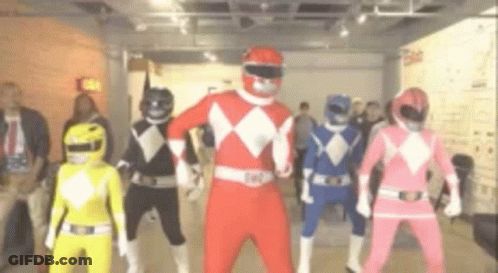 Man In White And Gold Power Ranger Costume With 'Feel The Power' Text GIF