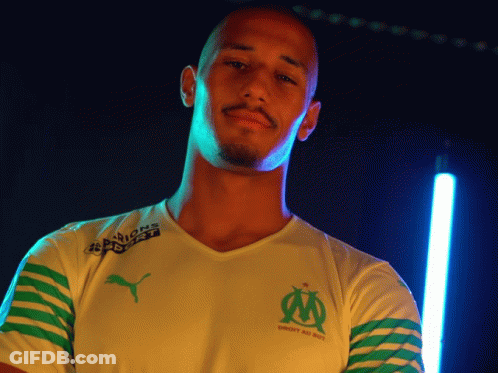 Man In White And Green Striped Shirt With Puma Logo GIF