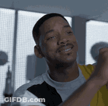 Man In White And Yellow Shirts Smiling GIF