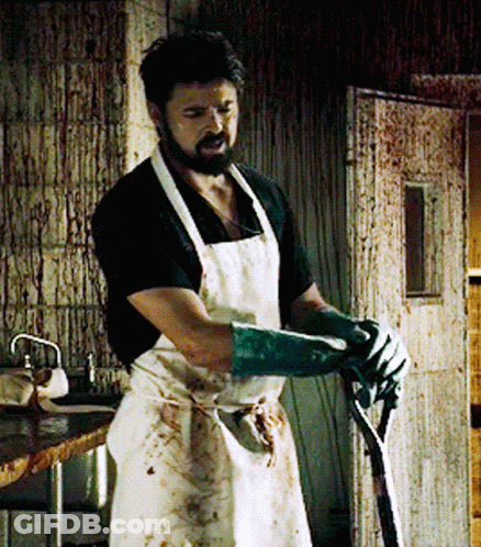 Man In White Apron And Green Gloves GIF