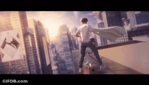 Man In White Cape On Rooftop With Broadway Sign GIF