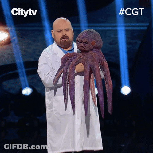 Man In White Coat Holding Purple Octopus Citytv Sign GIF