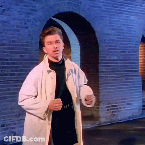 Man In White Coat Holding Toilet Paper GIF