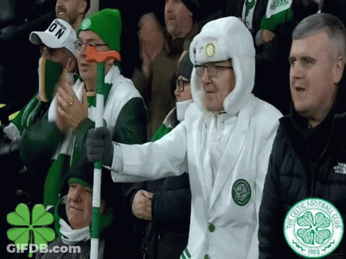 Man In White Coat With Celtic Logo GIF