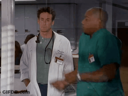 Man In White Coat With Name Tag Patrick GIF