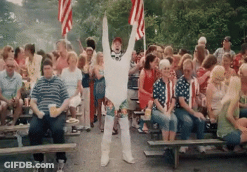 Man In White Costume Standing GIF