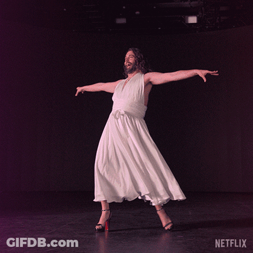 Man In White Dress And High Heels Dancing Netflix Logo GIF
