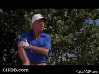 Man In White Hat And Blue Shirt On Golf Course GIF