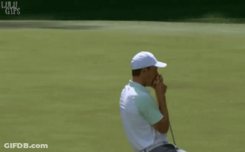 Man In White Hat And Green Shirt Holding Golf Club GIF