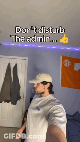 Man In White Hat And White Shirt With SEC Flag GIF