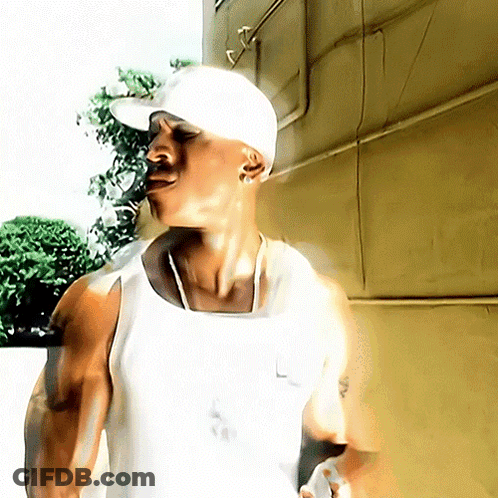 Man In White Hat And White Tank Top GIF