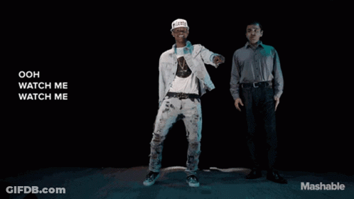 Man In White Hat Dancing Next To Man In Grey Shirt Mashable GIF
