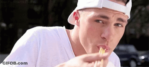 Man In White Hat Eating Sandwich GIF