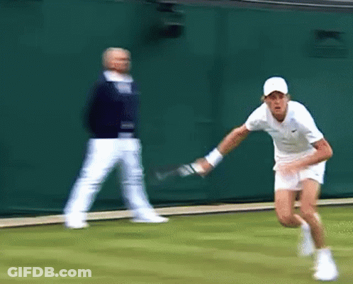 Man In White Hat Holding Tennis Racquet GIF