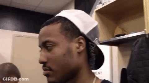 Man In White Hat Looking To Side GIF