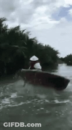 Man In White Hat Rowing Boat GIF