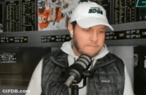 Man In White Hat Saying Edge Into Microphone GIF