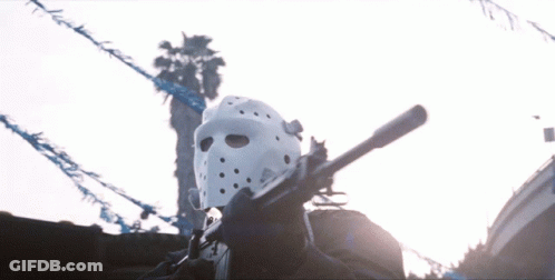 Man In White Hockey Mask Holding Gun GIF