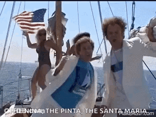 Man In White Hooded Costume In Front Of House GIF
