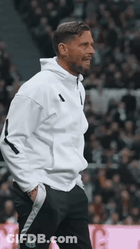 Man In White Hoodie And Black Pants On Soccer Field GIF