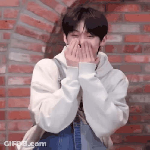 Man In White Hoodie Covering Face GIF