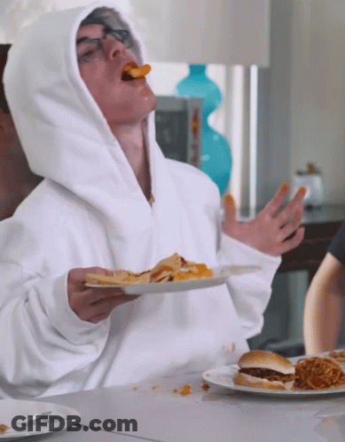 Man In White Hoodie Eating French Fries GIF