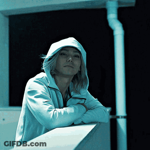Man In White Hoodie Leaning On Wall GIF