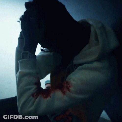 Man In White Hoodie With Blood On Arms GIF