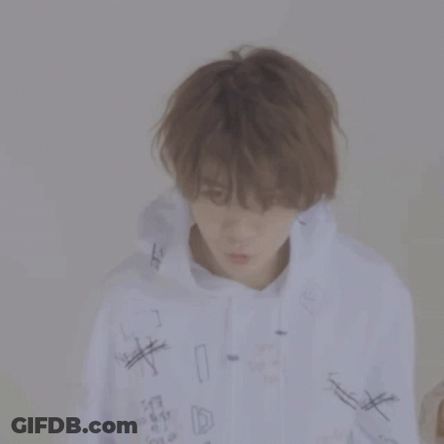 Man In White Hoodie With Graffiti GIF