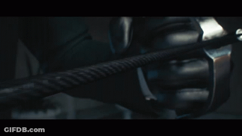 Man In White Hoodie With Hands Folded On Couch GIF