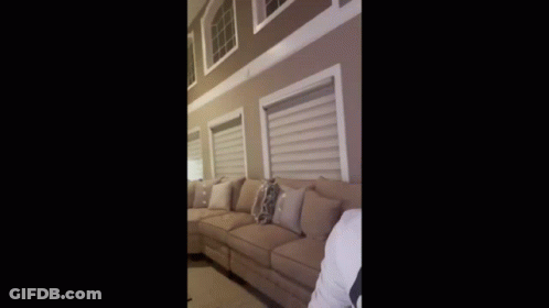 Man In White Hoodie With Letter A Laughing GIF