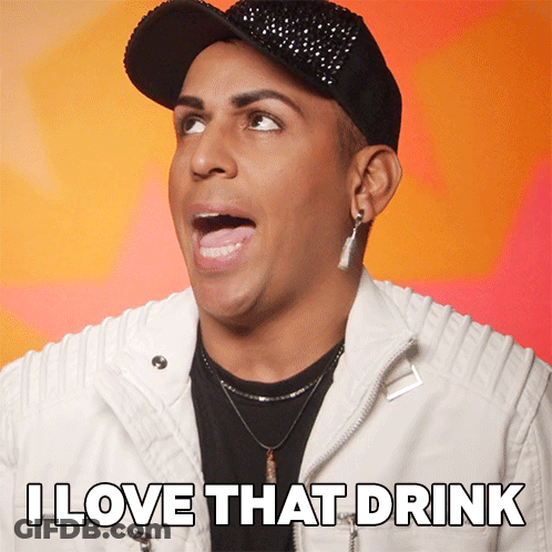 Man In White Jacket And Black Hat Says I Love That Drink GIF
