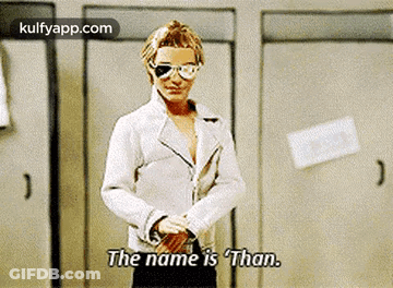 Man In White Jacket And Sunglasses Saying The Name Is Than GIF
