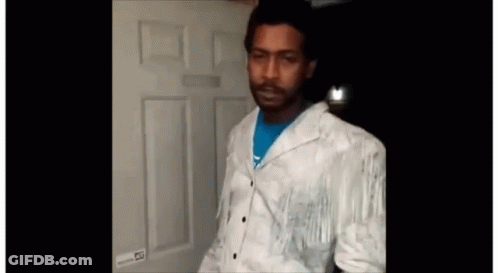Man In White Jacket At Door GIF