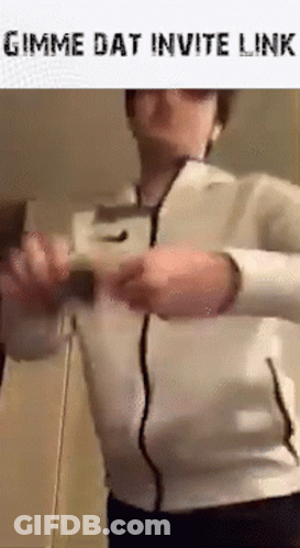 Man In White Jacket Holding Remote Control GIF