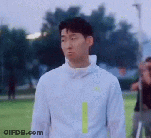 Man In White Jacket On Soccer Field GIF