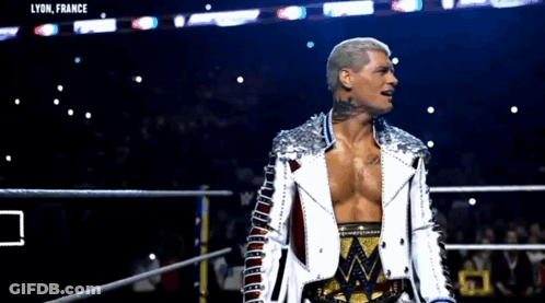 Man In White Jacket Standing In Ring Lyon France GIF