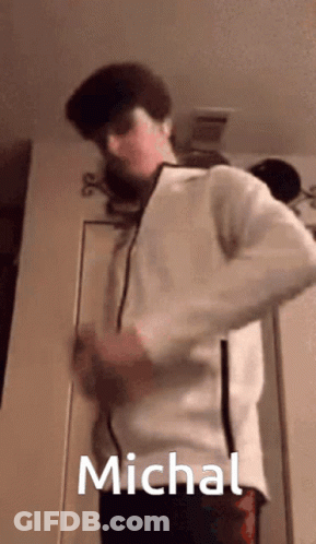 Man In White Jacket With Name Michal GIF