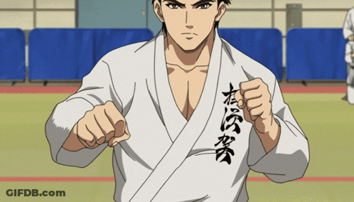 Man In White Karate Uniform With Chinese Writing GIF