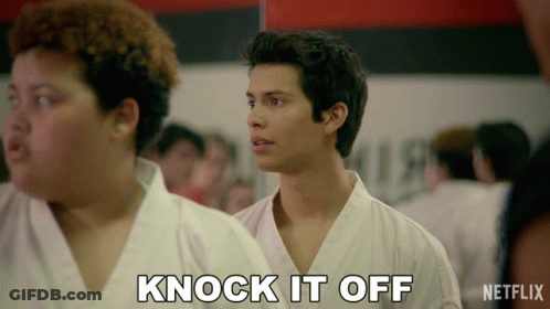 Man In White Karate Uniform With Knock It Off Text GIF